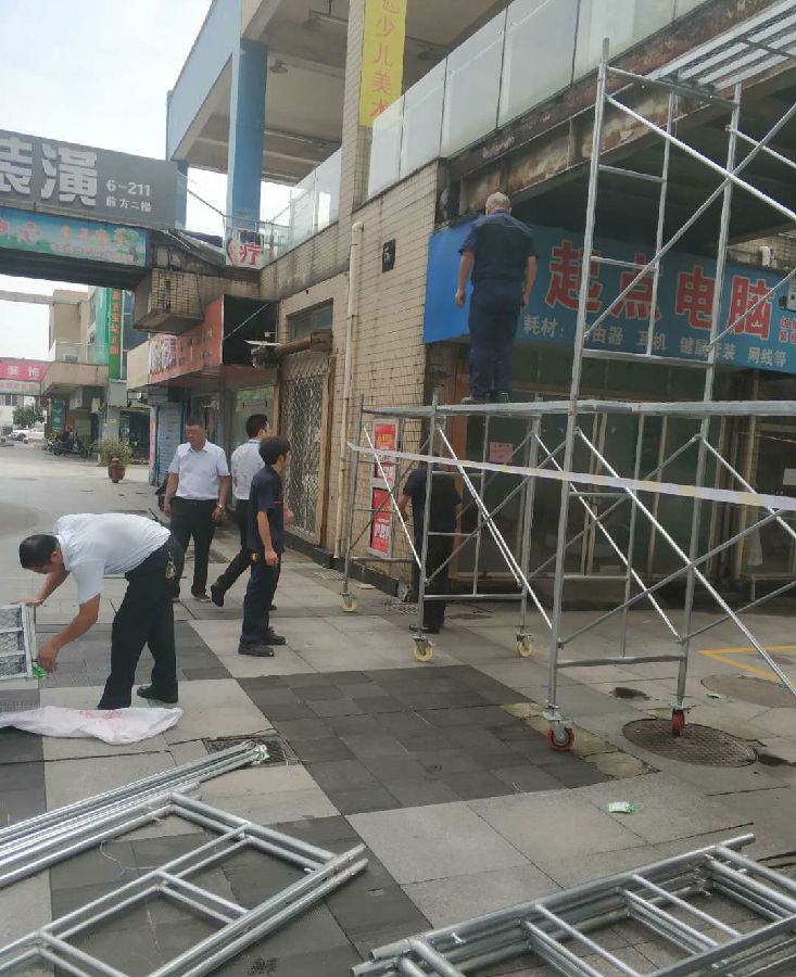 高温下挥汗如雨 旧颜焕新貌